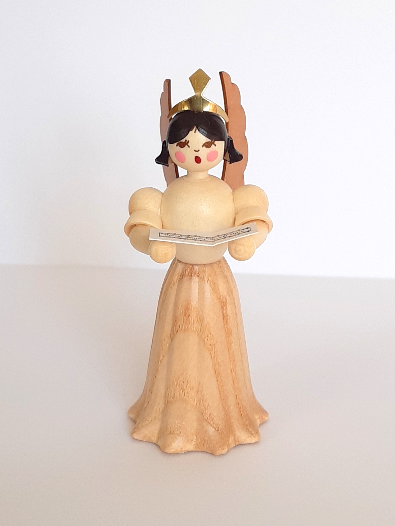 Langrockengel mit Notenbuch