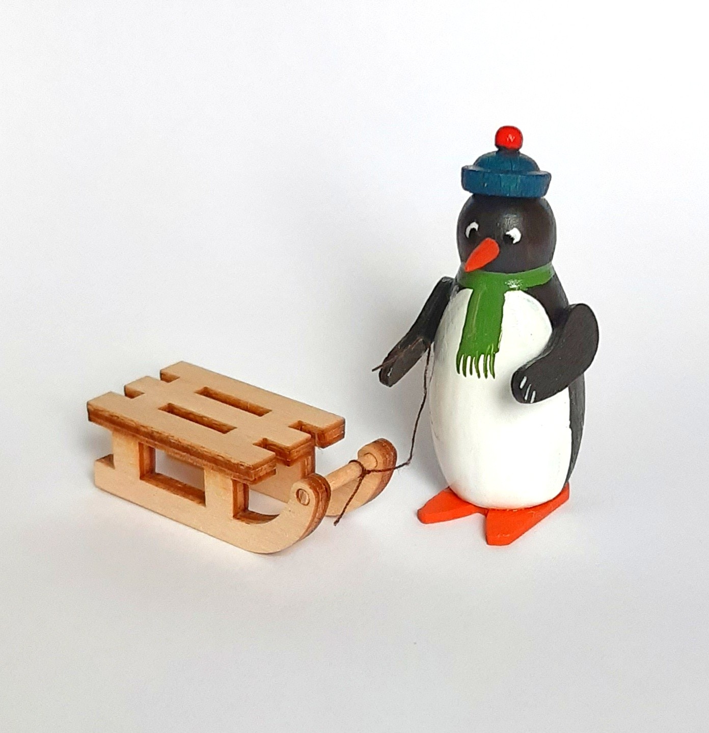 Pinguin mit Schlitten