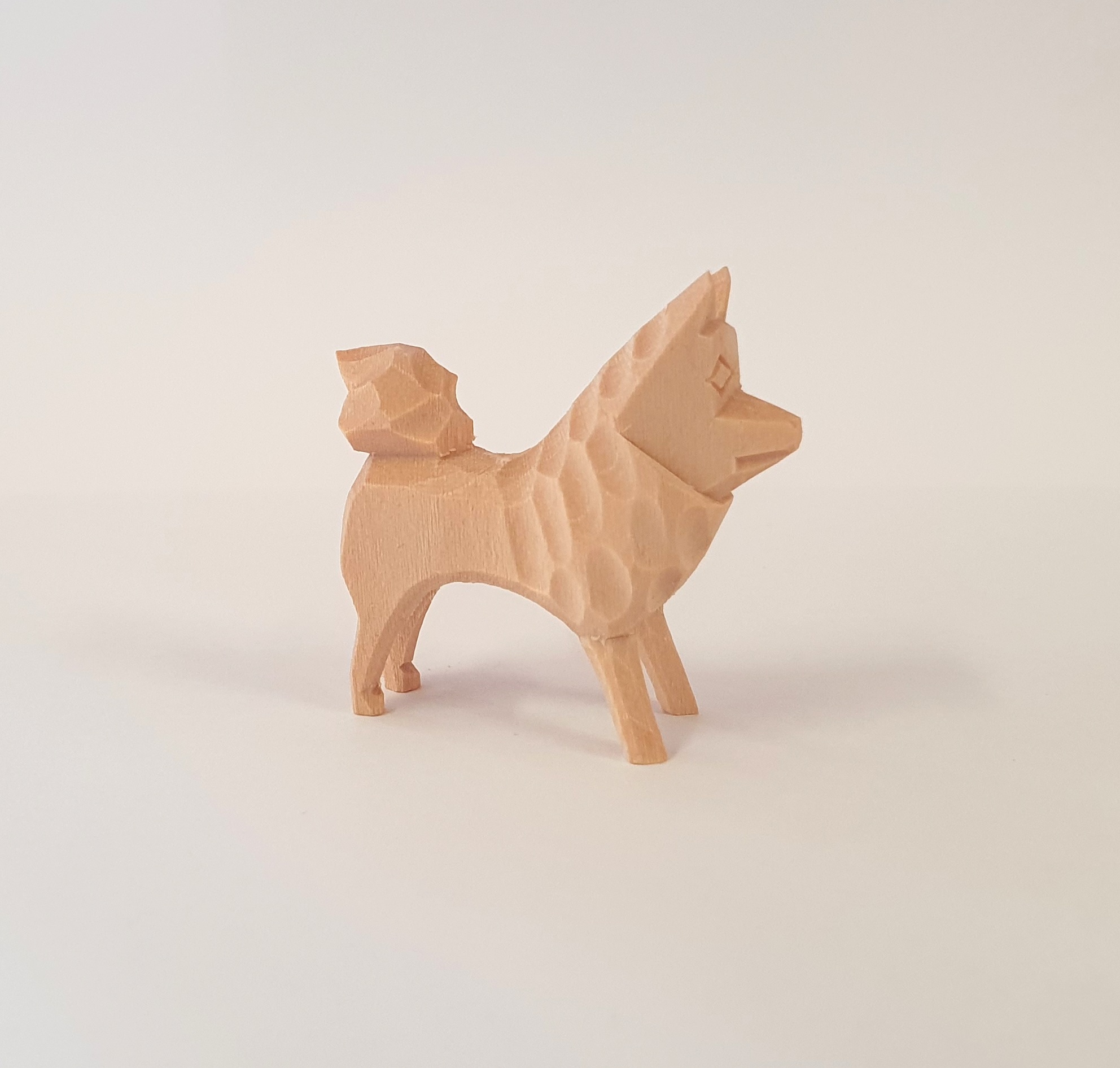 Hund - geschnitzt Höhe 3,5cm